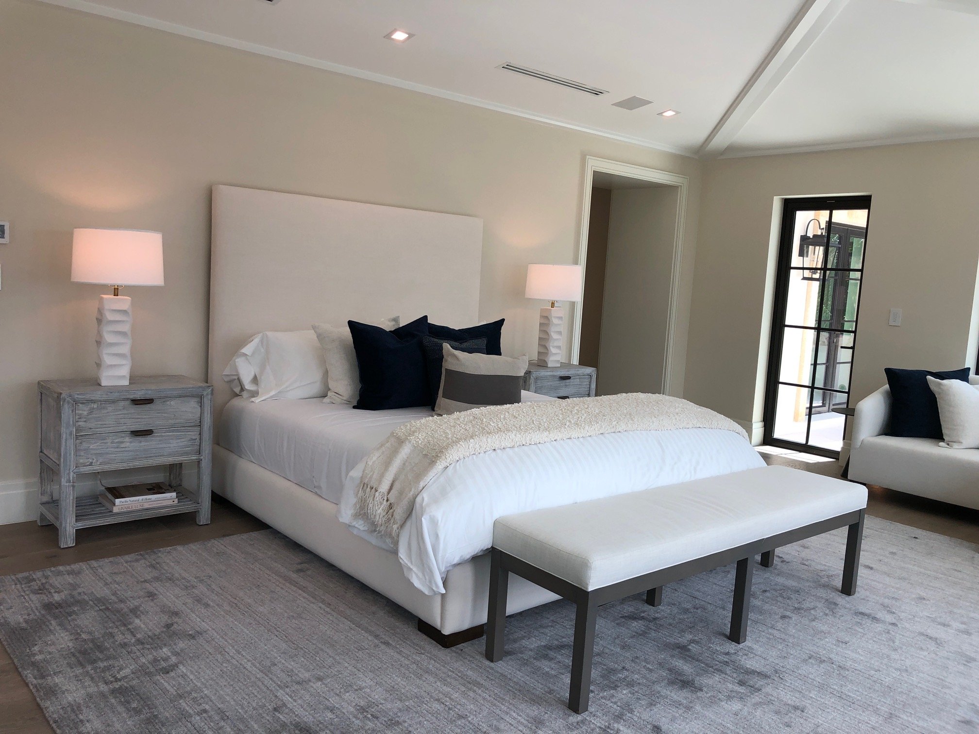 Neutral bedroom with layered textiles